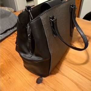 Tumi Elegant Black and Gray/Taupe Women's laptop travel bag.